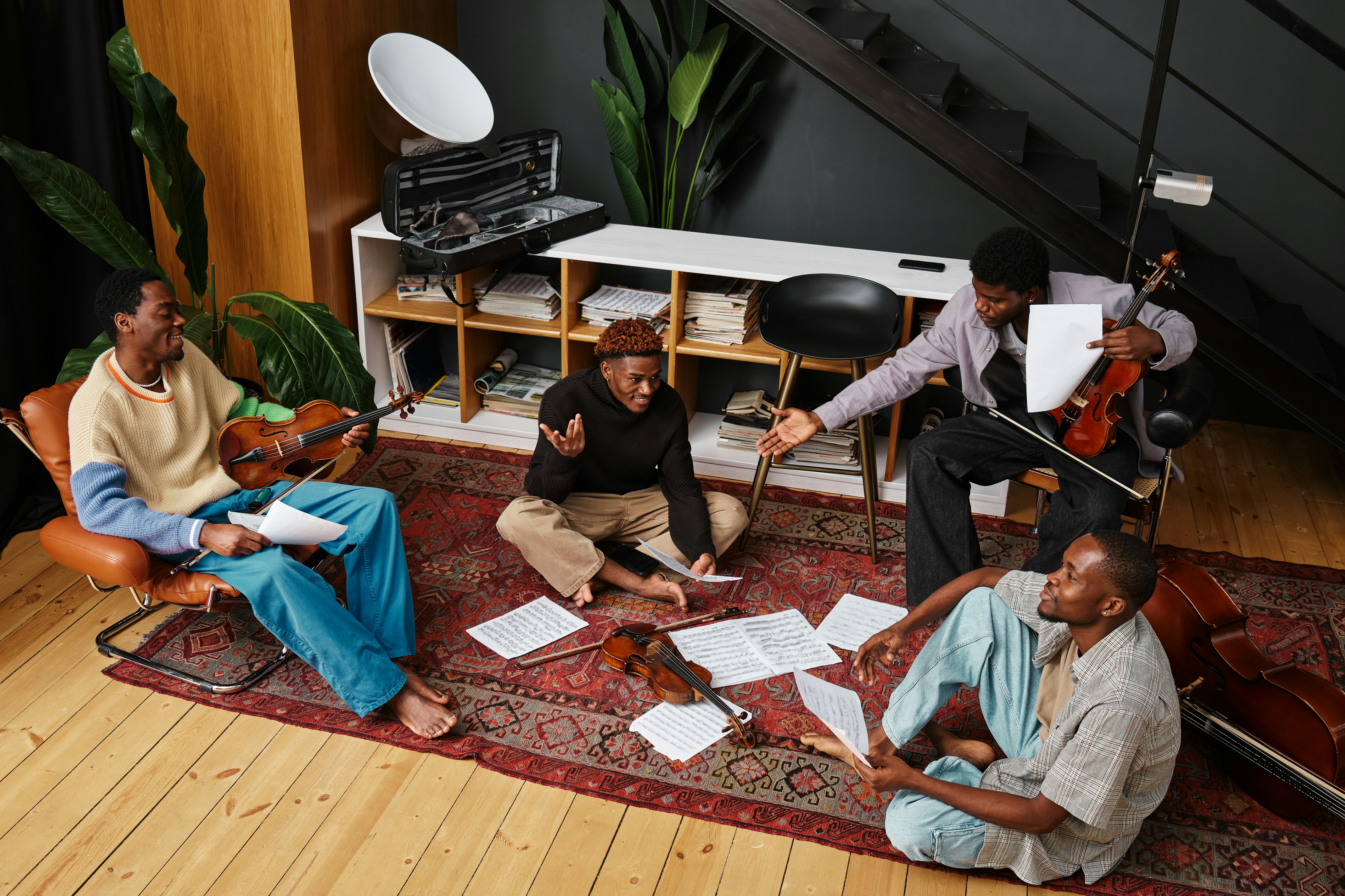 Group of musicians with papers on the ground