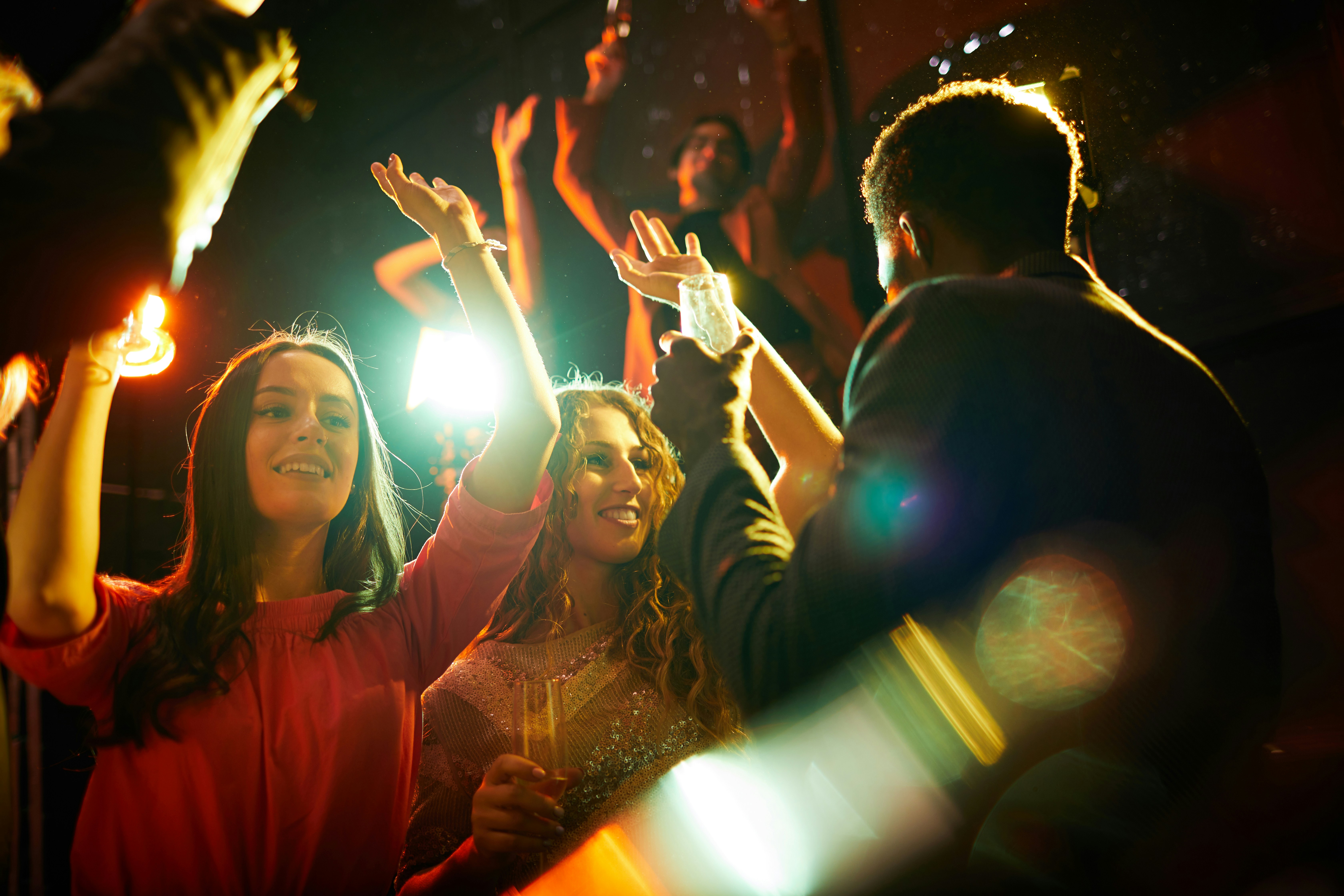 music fans at a concert dancing